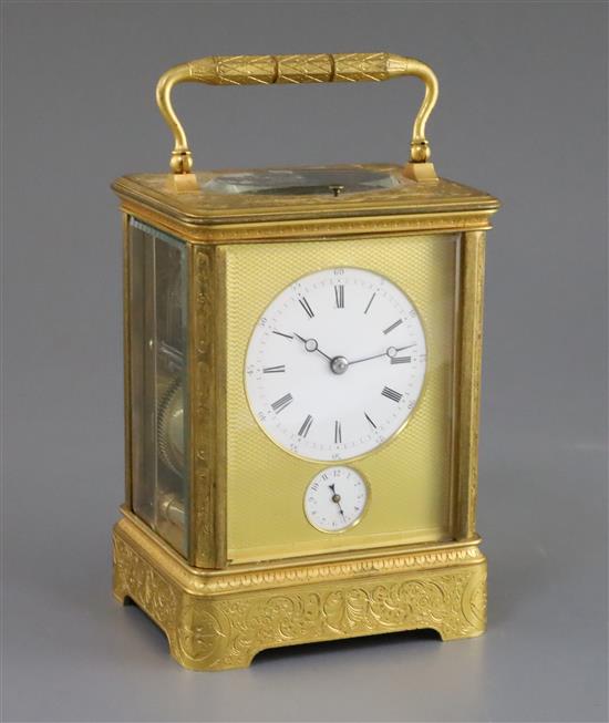 A late 19th century French ormolu hour repeating giant carriage clock, with alarm, height 7in.